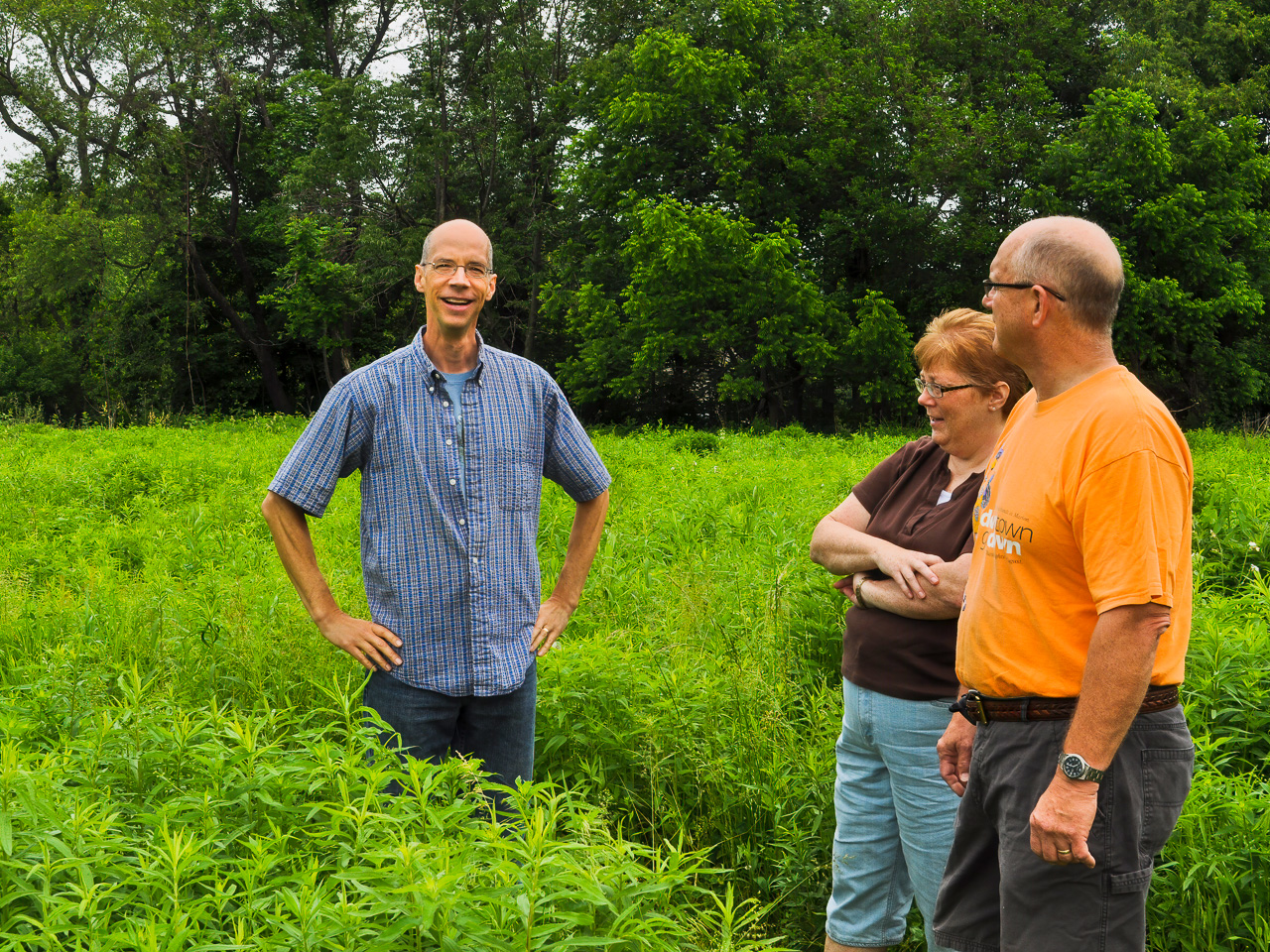 Gary in his meadow discussing options with clients