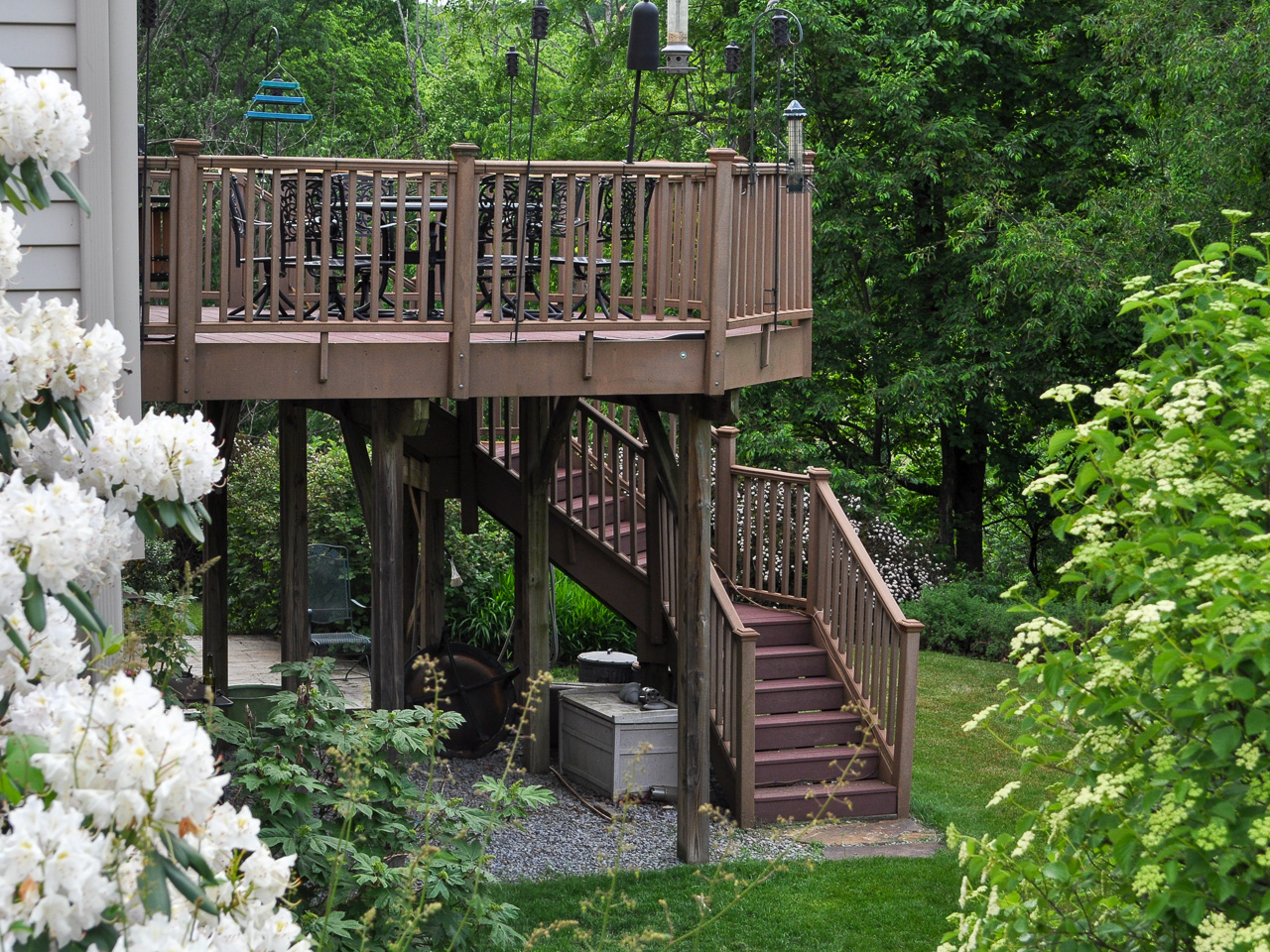 Backyard custom deck with angular staircase