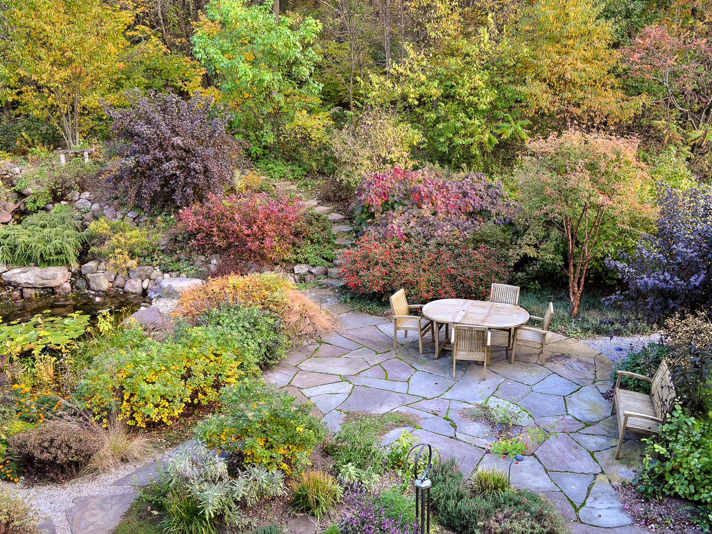 Natural design outdoor living space backyard patio in fall color